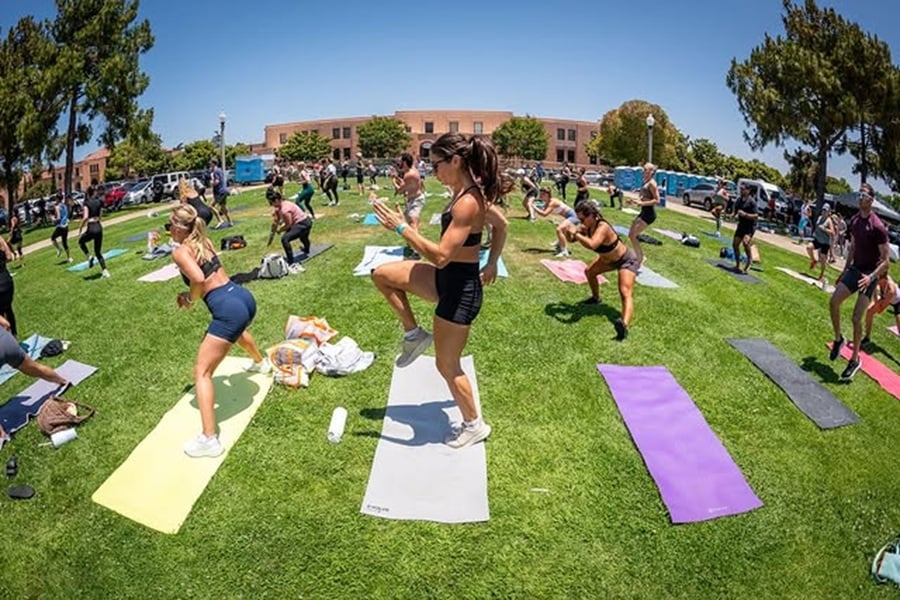 people doing yoga outside
